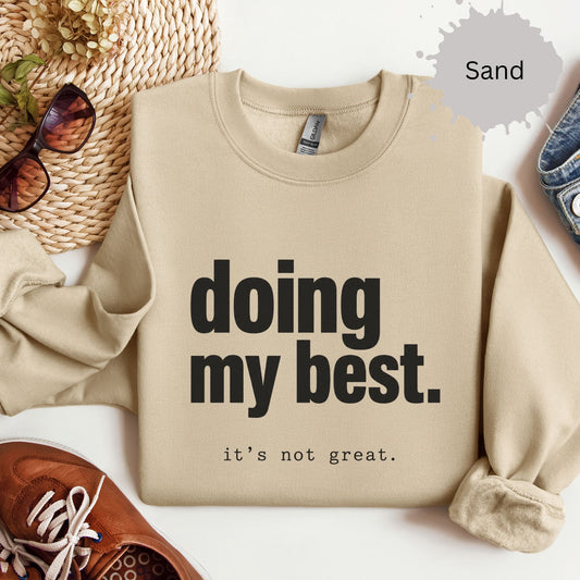Womens sweatshirt with bold text reading “doing my best. it’s not great.”