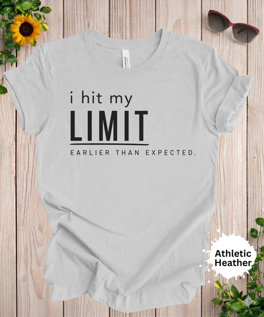 Women’s graphic T-shirt with the phrase “i hit my limit earlier than expected” in bold typography