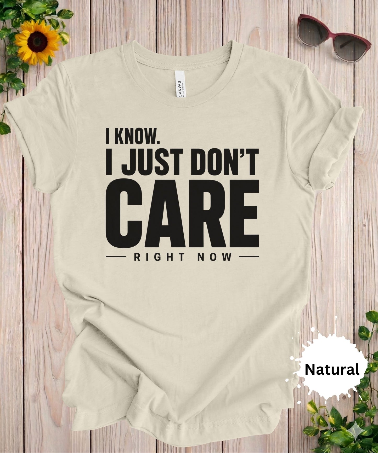 Women’s graphic T-shirt with the phrase “I know. I just don’t care right now” in bold typography
