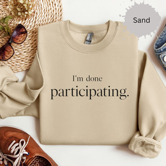 Sweatshirt with minimalist text reading “I’m done participating”