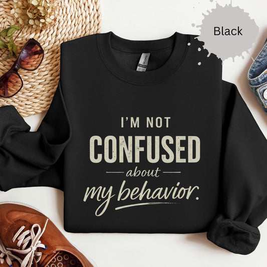 womens weatshirt with typography reading “I’m not confused about my behavior”