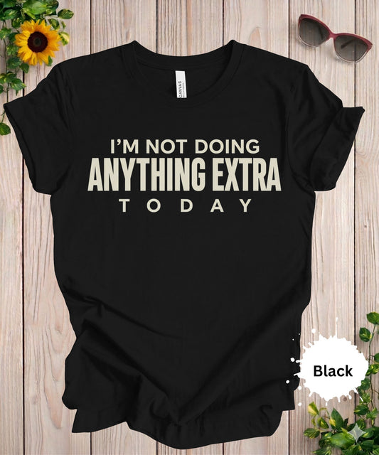 women’s graphic T-shirt with the phrase “I’m not doing anything extra today” in bold typography