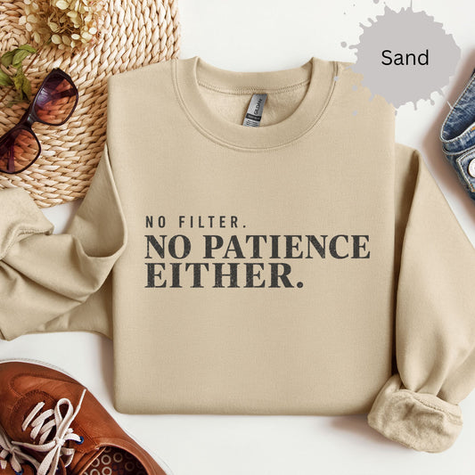 Crewneck sweatshirt with distressed text reading “No filter. No patience either.”
