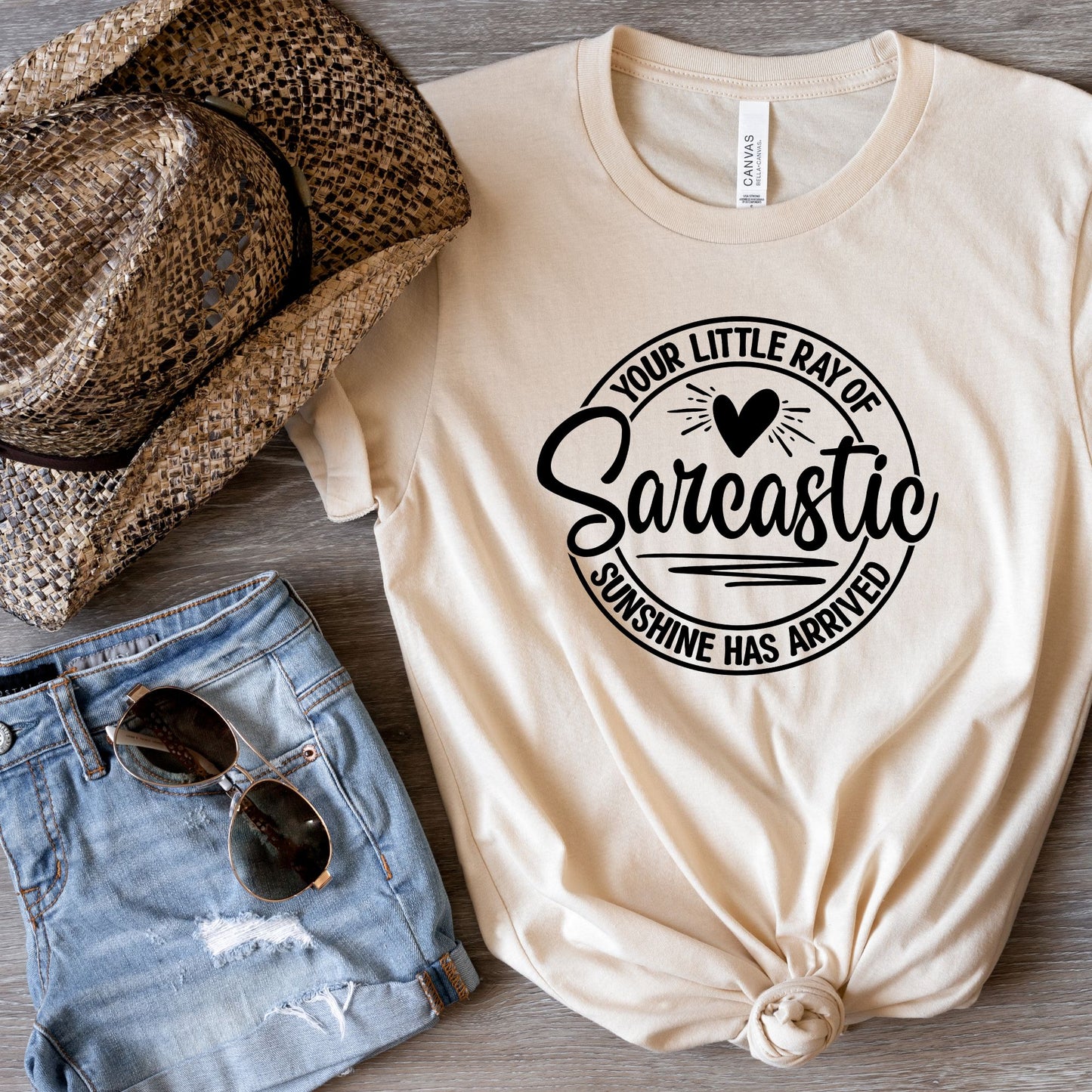 Witty Arrival: 'Little Ray of Sunshine' Tee with a Twist