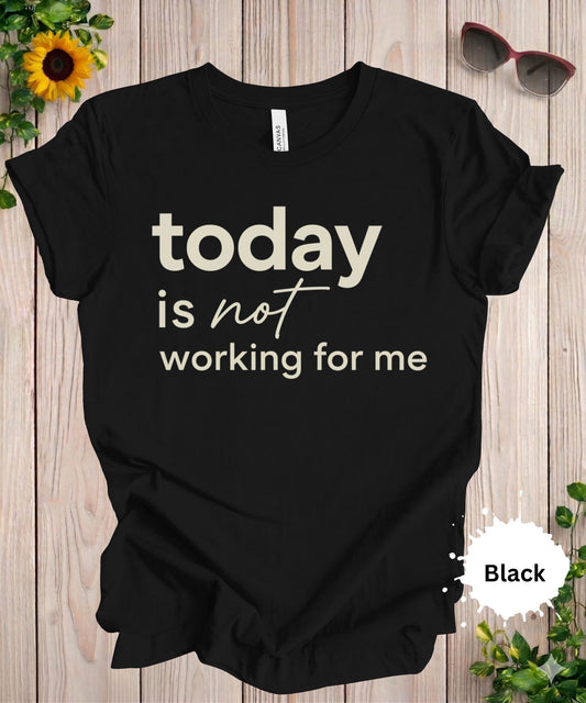 Women’s graphic T-shirt with the phrase “today is not working for me” in bold minimalist typography