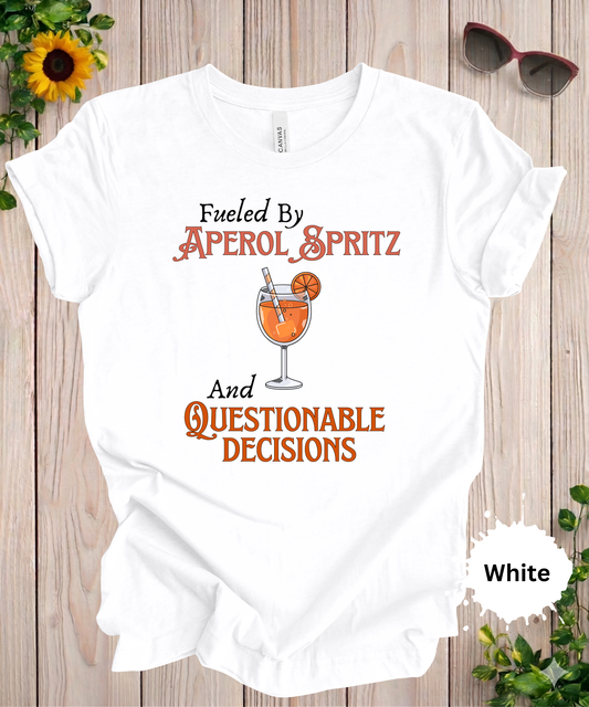 Woman wearing Fueled by Aperol Spritz and Questionable Decisions graphic t-shirt with orange cocktail design