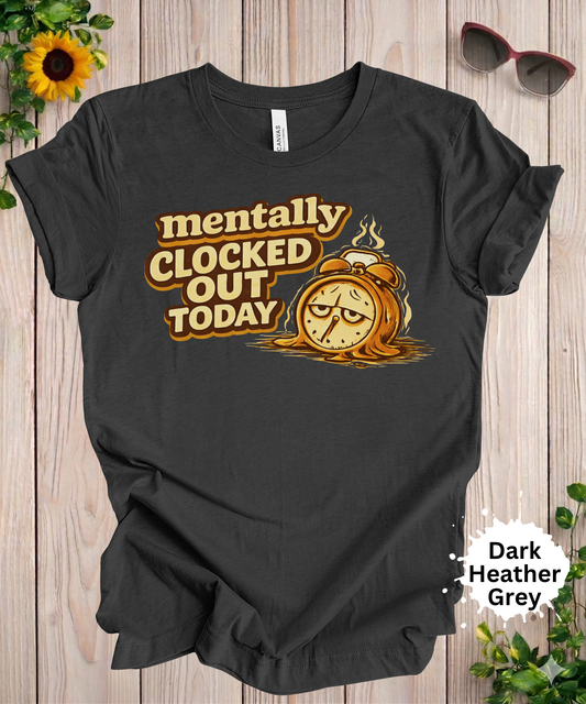 Woman’s graphic t-shirt with “Mentally Clocked Out Today” text and vintage melting clock illustration on dark heather grey shirt