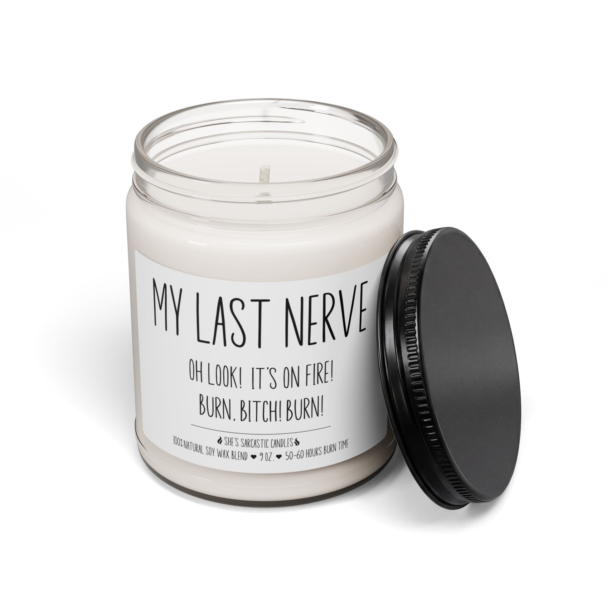 My Last Nerve scented soy candle in a clear glass jar with humorous typography label reading "Oh look! It's on fire! Burn, bitch! Burn!"
