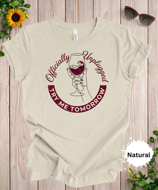 Woman wearing officially unplugged wine graphic t-shirt with wine glass illustration and relaxed sarcastic phrase